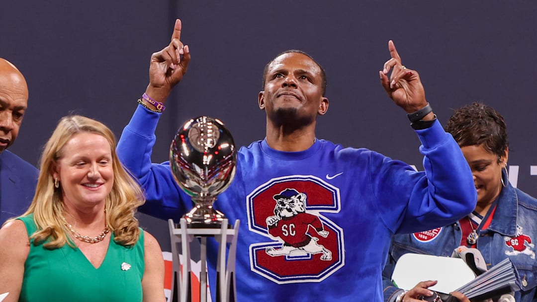 Dec 13, 2025; Atlanta, GA, USA; South Carolina State Bulldogs head coach Chennis Berry celebrates after a victory over the Prairie View A&M Panthers in quadruple overtime of the Celebration Bowl at Mercedes-Benz Stadium. Mandatory Credit: Brett Davis-Imagn Images
