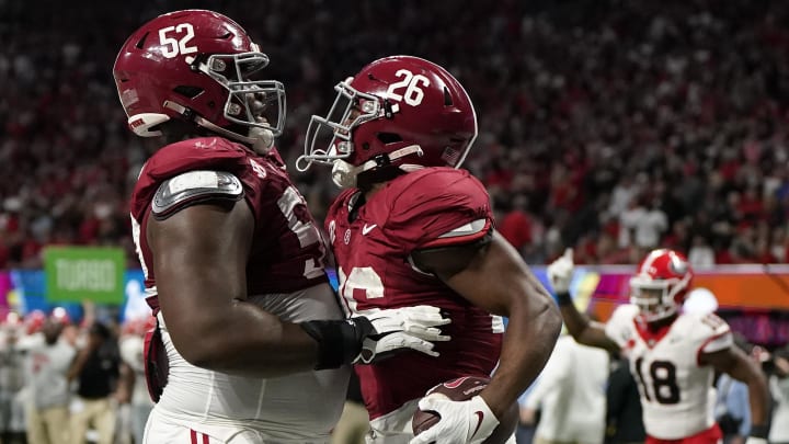 Dec 2, 2023; Atlanta, GA, USA; Alabama Crimson Tide running back Jam Miller (26) reacts after rushing for a touchdown against the Georgia Bulldogs during the first half in the SEC Championship game at Mercedes-Benz Stadium. Mandatory Credit: Dale Zanine-USA TODAY Sports