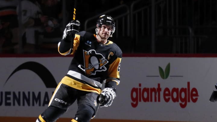 Jan 15, 2024; Pittsburgh, Pennsylvania, USA;  Pittsburgh Penguins center Sidney Crosby (87) reacts after being named a star of the game against the Seattle Kraken at PPG Paints Arena. Mandatory Credit: Charles LeClaire-USA TODAY Sports