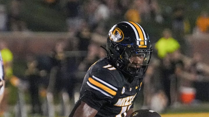 Aug 29, 2024; Columbia, Missouri, USA; Missouri Tigers running back Kewan Lacy (11) runs the ball against the Murray State Racers during the game at Faurot Field at Memorial Stadium. Mandatory Credit: Denny Medley-Imagn Images