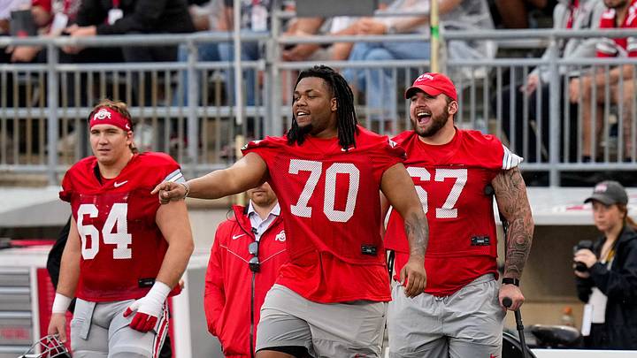 Offensive lineman Phillip Daniels (70) and Austin Siereveld (67) tease their teammate in the first half of the Ohio State football spring game at Ohio Stadium on Saturday, April 18, 2026 in Columbus, Ohio.