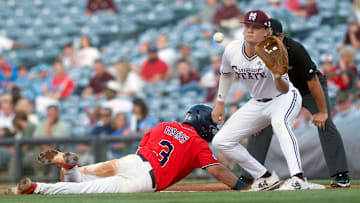 MIssissippi State's Hunter Hines (44) waits for the throw from the pitcher as Ole Miss' Andrew Fischer (3) is safe at first at Trustmark Park in Pearl, Miss., Wednesday, May 1, 2024.