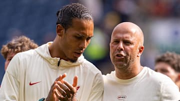 Virgil van Dijk (left) missed both games against Athletic Club at Anfield.