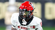Sep 11, 2025; Winston-Salem, North Carolina, USA;  North Carolina State Wolfpack quarterback CJ Bailey (11) runs the ball in first half against Wake Forest Demon Deacons at Allegacy Federal Credit Union Stadium. Mandatory Credit: Luke Jamroz-Imagn Images