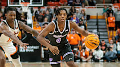 Dai Dai Ames drives the ball during the Kansas State men's basketball game at Oklahoma State.