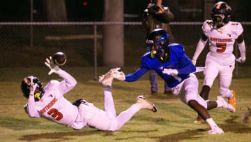 Hawthorne Hornets Terrell James (3) almost intercepts a pass intended for Wildwood Wildcats Vernell Brown iii (1) in the first half. Hawthorne Hornets took on the Wildwood Wildcats in 1R Regional Semifinal at Hawthorne High School in Hawthorne, FL on Friday, November 18, 2022. Hawthorne won 33-15.  [Doug Engle/Ocala Star Banner]

Flgai 112022 Ww Hawthorne Fb