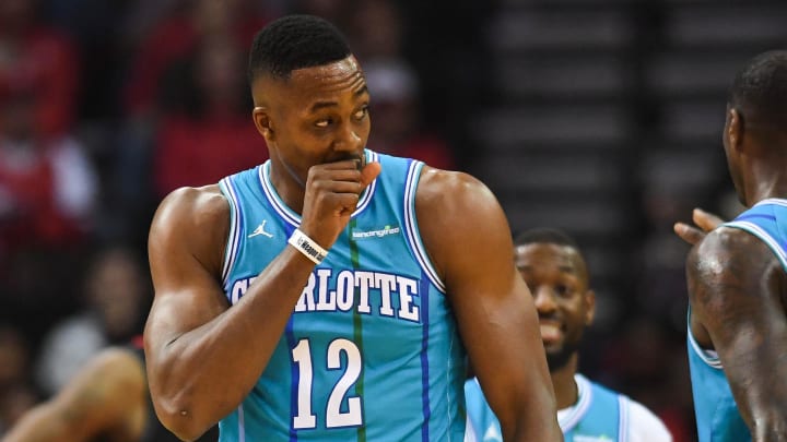 Dec 13, 2017; Houston, TX, USA; Charlotte Hornets center Dwight Howard (12) reacts after a dunk during the first quarter against the Houston Rockets at Toyota Center. Mandatory Credit: Shanna Lockwood-USA TODAY Sports