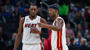 Dec 12, 2022; Indianapolis, Indiana, USA; Miami Heat center Bam Adebayo (13) and forward Jimmy Butler (22) talk in the second quarter against the Indiana Pacers at Gainbridge Fieldhouse. Mandatory Credit: Trevor Ruszkowski-Imagn Images