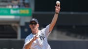 Jul 6, 2024; Bronx, New York, USA; UConn Huskies head coach Dan Hurley throws a ceremonial first pitch before the game between the New York Yankees and the Boston Red Sox at Yankee Stadium. Mandatory Credit: Vincent Carchietta-USA TODAY Sports