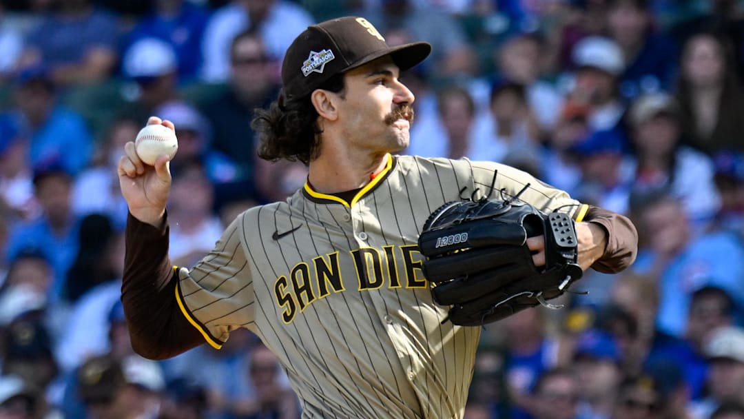 Oct 1, 2025; Chicago, Illinois, USA; San Diego Padres starting pitcher Dylan Cease (84) delivers a pitch against the Chicago Cubs in the first inning during game two of the Wildcard round for the 2025 MLB playoffs at Wrigley Field. 