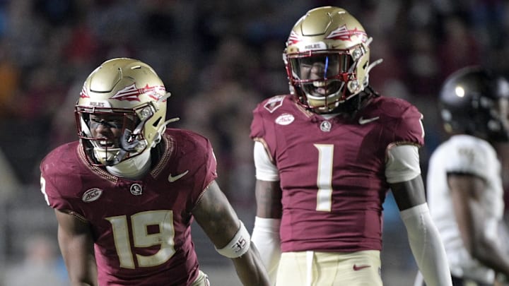 Nov 1, 2025; Tallahassee, Florida, USA; Florida State Seminoles defensive back Jerry Wilson (19) celebrates a big tackle with defensive back Shyheim Brown (1) during the second half at Doak S. Campbell Stadium. Mandatory Credit: Melina Myers-Imagn Images Nov 1, 2025; Tallahassee, Florida, USA; Florida State Seminoles defensive back Jerry Wilson (19) celebrates a big tackle with defensive back Shyheim Brown (1) during the second half at Doak S. Campbell Stadium. Mandatory Credit: Melina Myers-Imagn Images