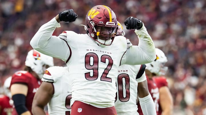 Washington Commanders defensive end Dorance Armstrong celebrates after sacking Arizona Cardinals quarterback Kyler Murray.