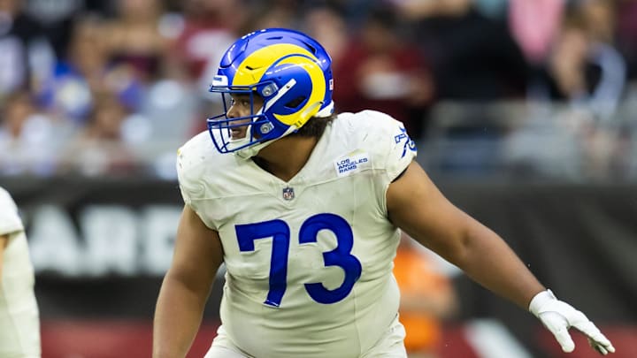 Nov 26, 2023; Glendale, Arizona, USA; Los Angeles Rams guard Steve Avila (73) against the Arizona Cardinals at State Farm Stadium. Mandatory Credit: Mark J. Rebilas-Imagn Images