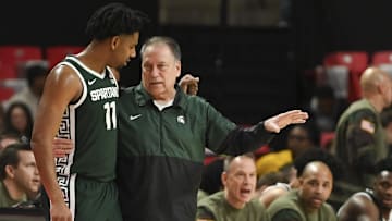 Jan 21, 2024; College Park, Maryland, USA; Michigan State Spartans head coach Tom Izzo speaks with Mguard A.J. Hoggard (11) during a time out in the first half against the Maryland Terrapins at Xfinity Center. Mandatory Credit: Tommy Gilligan-Imagn Images