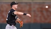 Chicago White Sox shortstop Colson Montgomery (12) throws a runner out at first against the Atlanta Braves at Truist Park. 