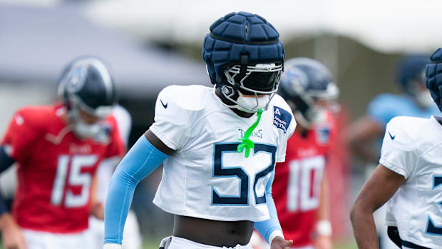 Tennessee Titans linebacker James Williams Sr. goes through warmups during training camp