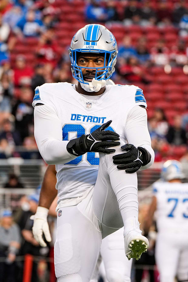 Detroit Lions defensive end Za'Darius Smith stretches at warm up before the game against the San Francisco 49ers