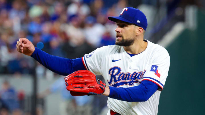 Jul 24, 2024; Arlington, Texas, USA; Texas Rangers starting pitcher Nathan Eovaldi (17) reacts after throwing a strike out during the seventh inning against the Chicago White Sox at Globe Life Field. 