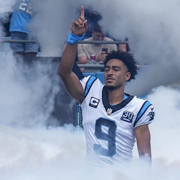 Sep 15, 2024; Charlotte, North Carolina, USA; Carolina Panthers quarterback Bryce Young (9) takes the field against the Los Angeles Chargers during the first quarter at Bank of America Stadium. Mandatory Credit: Jim Dedmon-Imagn Images