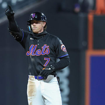 Apr 18, 2025; New York City, New York, USA;  New York Mets second baseman Brett Baty (7) reacts after hitting a double in the fifth inning against the St. Louis Cardinals at Citi Field. Mandatory Credit: Wendell Cruz-Imagn Images