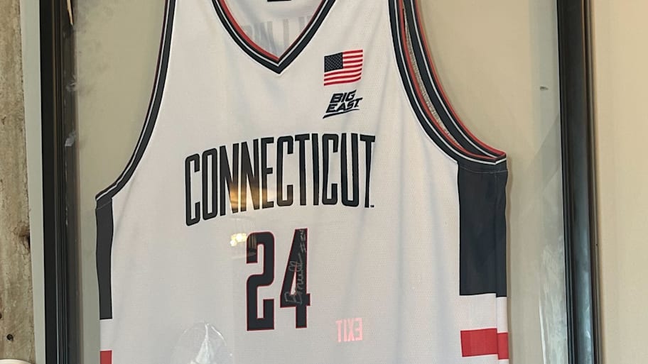 A framed Braylon Mullins jersey hangs in The Depot in Greenfield.