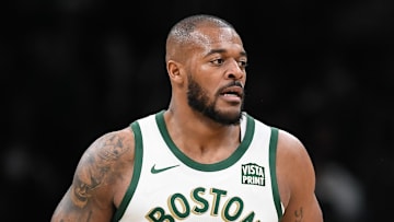 Apr 7, 2024; Boston, Massachusetts, USA; Boston Celtics forward Xavier Tillman Sr. (26) looks on during the second half against the Portland Trail Blazers at TD Garden. Mandatory Credit: Eric Canha-Imagn Images