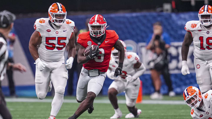 Aug 31, 2024; Atlanta, Georgia, USA; Georgia Bulldogs running back Nate Frazier (3) runs with the ball against the Clemson Tigers at Mercedes-Benz Stadium. Mandatory Credit: Dale Zanine-USA TODAY Sports