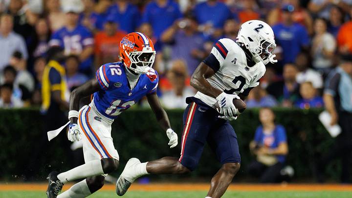 Sep 5, 2026; Gainesville, Florida, USA; Florida Gators cornerback Ben Hanks III (12) defends Florida Atlantic Owls wide receiver Kelby Valsin (2) during the first half at Ben Hill Griffin Stadium. Mandatory Credit: Matt Pendleton-Imagn Images