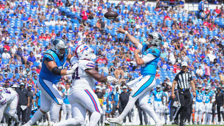 Aug 24, 2024; Orchard Park, New York, USA; Carolina Panthers quarterback Jack Plummer (16) throws the ball for a two point conversion against the Buffalo Bills during the second half at Highmark Stadium.