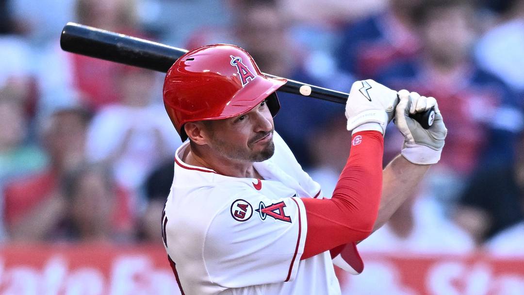 Jun 12, 2026; Anaheim, California, USA; Los Angeles Angels first baseman Trey Mancini (34) hits an RBI triple during the first inning against the Tampa Bay Rays at Angel Stadium. Mandatory Credit: William Liang-Imagn Images