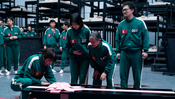 Park Sung-hoon as Cho Hyun-ju, Jo Yu-ri as Kim Jun-hee, Kang Ae-sim as Jang Geum-ja, Yang Dong-geun as Park Yong-sik in Squid Game season 3