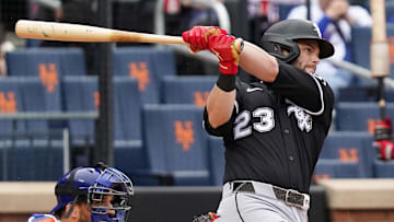 Chicago White Sox left fielder Andrew Benintendi (23) hits against the New York Mets at Citi Field. 