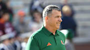 Nov 22, 2025; Blacksburg, Virginia, USA; Miami (FL) Hurricanes head coach Mario Cristobalat before the game at Lane Stadium. Mandatory Credit: Brian Bishop-Imagn Images