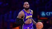 Feb 25, 2025; Los Angeles, California, USA; Los Angeles Lakers forward LeBron James (23) dribbles the ball against the Dallas Mavericks during the second half at Crypto.com Arena. Mandatory Credit: Gary A. Vasquez-Imagn Images