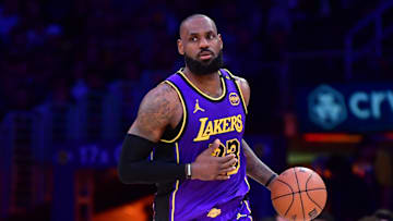 Feb 25, 2025; Los Angeles, California, USA; Los Angeles Lakers forward LeBron James (23) dribbles the ball against the Dallas Mavericks during the second half at Crypto.com Arena. Mandatory Credit: Gary A. Vasquez-Imagn Images