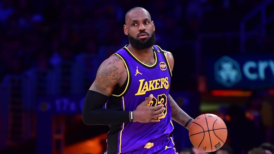Feb 25, 2025; Los Angeles, California, USA; Los Angeles Lakers forward LeBron James (23) dribbles the ball against the Dallas Mavericks during the second half at Crypto.com Arena. Mandatory Credit: Gary A. Vasquez-Imagn Images