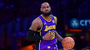 Feb 25, 2025; Los Angeles, California, USA; Los Angeles Lakers forward LeBron James (23) dribbles the ball against the Dallas Mavericks during the second half at Crypto.com Arena. Mandatory Credit: Gary A. Vasquez-Imagn Images
