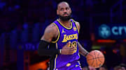 Feb 25, 2025; Los Angeles, California, USA; Los Angeles Lakers forward LeBron James (23) dribbles the ball against the Dallas Mavericks during the second half at Crypto.com Arena. Mandatory Credit: Gary A. Vasquez-Imagn Images