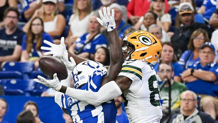 Indiana Colts' Tyler Kahmann (43) breaks up a pass intended for Green Bay Packers wide receiver Isaiah Neyor (80)