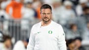 Oregon head coach Dan Lanning walks the field during warmups as the Oregon Ducks face the Penn State Nittany Lions on Sept. 27, 2025, at Beaver Stadium in University Park, Pennsylvania.