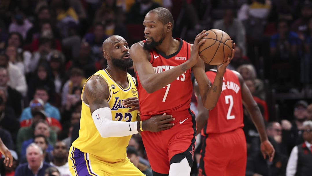 Mar 16, 2026; Houston, Texas, USA; Los Angeles Lakers forward LeBron James (23) defends against Houston Rockets forward Kevin Durant (7) during the fourth quarter at Toyota Center. Mandatory Credit: Troy Taormina-Imagn Images