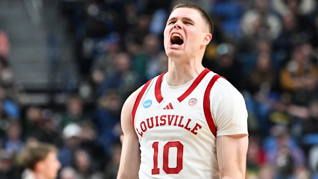 Mar 19, 2026; Buffalo, NY, USA; Louisville Cardinals guard Isaac McKneely (10) reacts to a play during the second half against the South Florida Bulls during a first round game of the men's 2026 NCAA Tournament at Keybank Center. Mandatory Credit: Mark Konezny-Imagn Images
