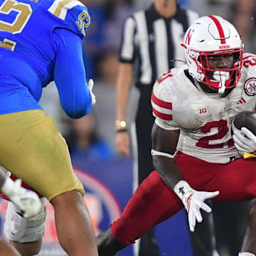 Emmett Johnson's 100-yard rushing, 100-yard receiving day was crucial in the Huskers' victory against UCLA
