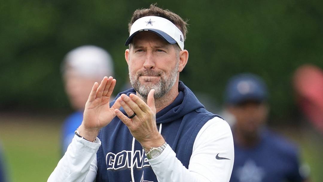 Dallas Cowboys head coach Brian Schottenheimer on the field during practice at the Ford Center at the Star Training Facility in Frisco, Texas.
