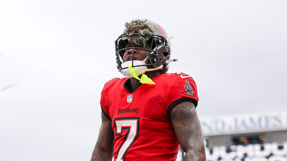 Tampa Bay Buccaneers running back Bucky Irving celebrates after scoring a touchdown against the Carolina Panthers in the second quarter at Raymond James Stadium. | Nathan Ray Seebeck-Imagn Images