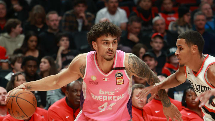 Oct 10, 2023; Portland, OR, USA;  New Zealand Breakers forward Dan Fotu (42) dribbles against the Portland Trail Blazers in the second half at Moda Center. Mandatory Credit: Jaime Valdez-USA TODAY Sports