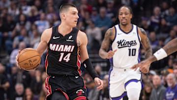 Jan 6, 2025; Sacramento, California, USA; Miami Heat guard Tyler Herro (14) controls the ball against the Sacramento Kings during the first quarter at Golden 1 Center. Mandatory Credit: Ed Szczepanski-Imagn Images