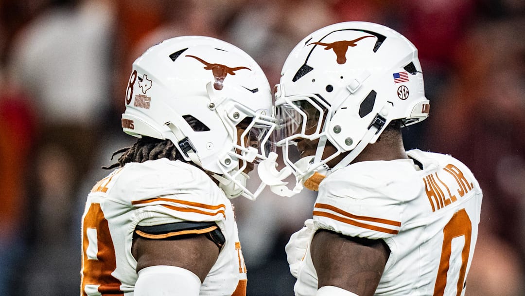 Jan 10, 2025; Arlington, TX, USA; Texas Longhorns linebacker Anthony Hill Jr. (0) celebrates a play with linebacker Barryn Sorrell (88) in the second quarter as the Texas Longhorns play the Ohio State Buckeyes in the Cotton Bowl College Football Playoff semi-final at AT&T Stadium in Dallas, Texas. Mandatory Credit: Sara Diggins/USA TODAY Network via Imagn Images Jan 10, 2025; Arlington, TX, USA; Texas Longhorns linebacker Anthony Hill Jr. (0) celebrates a play with linebacker Barryn Sorrell (88) in the second quarter as the Texas Longhorns play the Ohio State Buckeyes in the Cotton Bowl College Football Playoff semi-final at AT&T Stadium in Dallas, Texas. Mandatory Credit: Sara Diggins/USA TODAY Network via Imagn Images