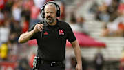 Matt Rhule walks on the field during the game against the Maryland Terrapins.