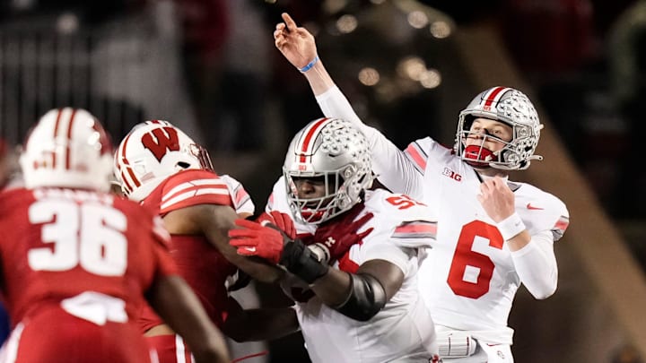 Oct 28, 2023; Madison, Wisconsin, USA; Ohio State Buckeyes quarterback Kyle McCord (6) throws a pass during the NCAA football game against the Wisconsin Badgers at Camp Randall Stadium. Oct 28, 2023; Madison, Wisconsin, USA; Ohio State Buckeyes quarterback Kyle McCord (6) throws a pass during the NCAA football game against the Wisconsin Badgers at Camp Randall Stadium.